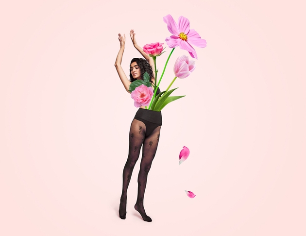 Model wears Heist Lady Garden vulva-print tights