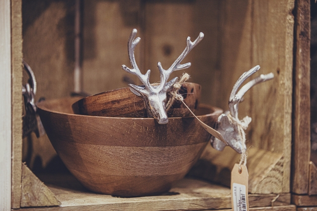 Silver deer on wooden bowls
