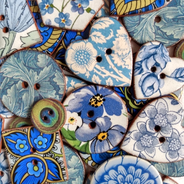 Close up of patterned blue buttons