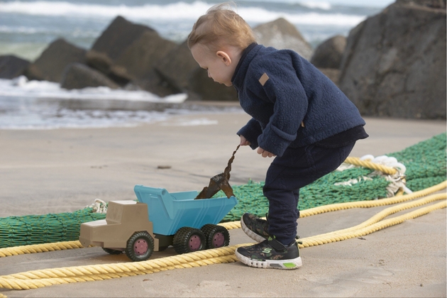 Child playing with dantoy new recycled marine range 