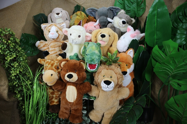 range of animal puppets, jungle characters and cats and dogs and a dinosaur 