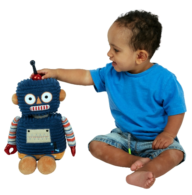 toddler playing with a blue robot teddy