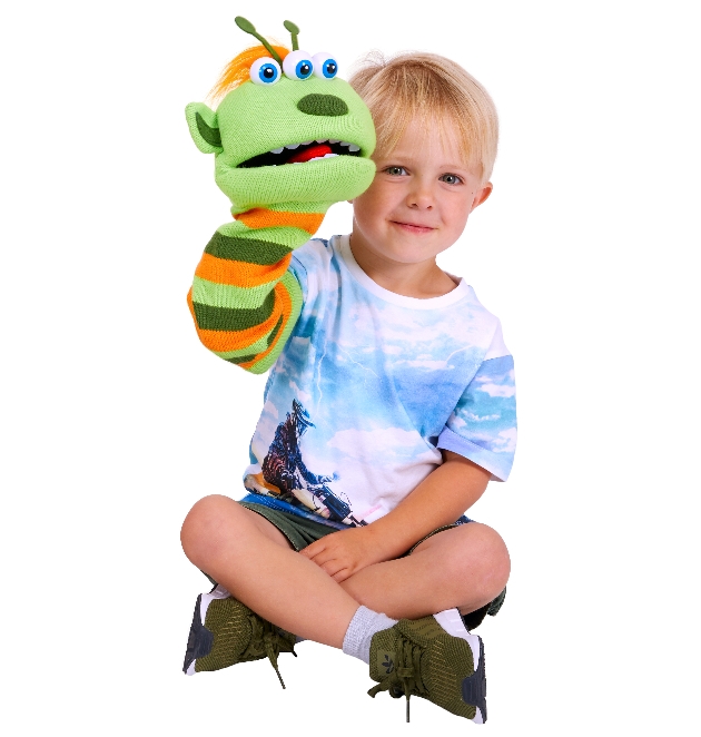young boy holding a long sock puppet on his arm