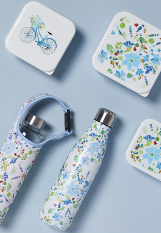 range of water bottles and lunch boxes in a floral print