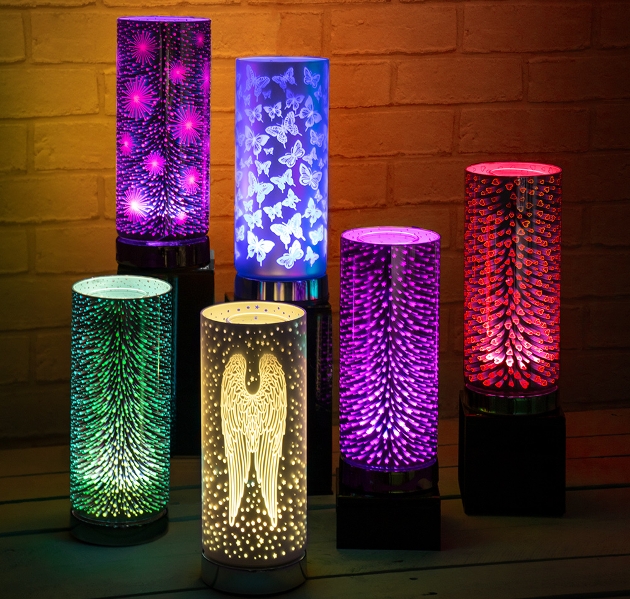 aroma lamps in primary colours with different glowing patterns on them