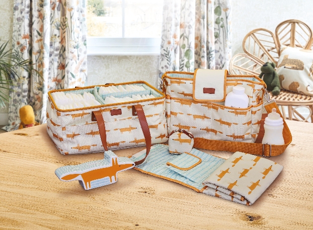 baby carrier range with orange fox print
