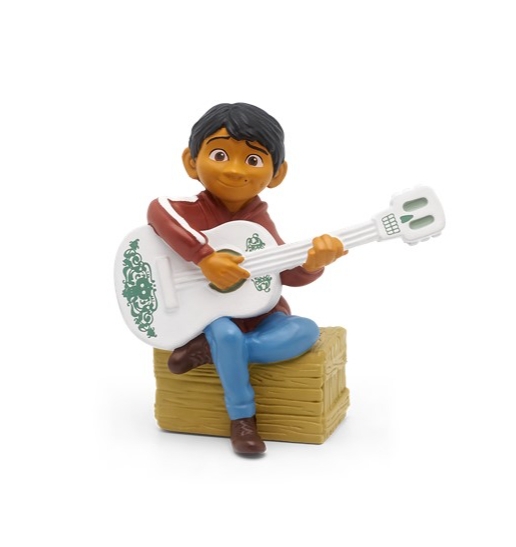 Coco character sat on a box with a guitar