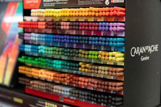 display stand of coloured pencils