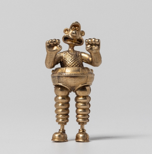 wallace in robot legs suit cast in gold