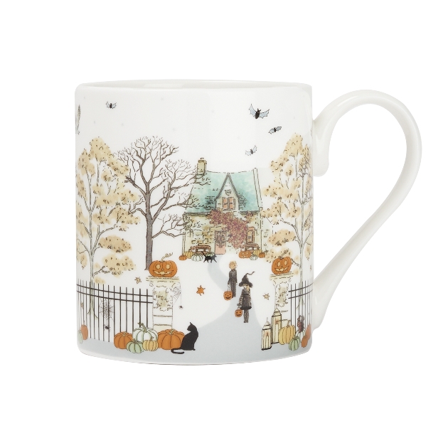 white mug with halloween design on