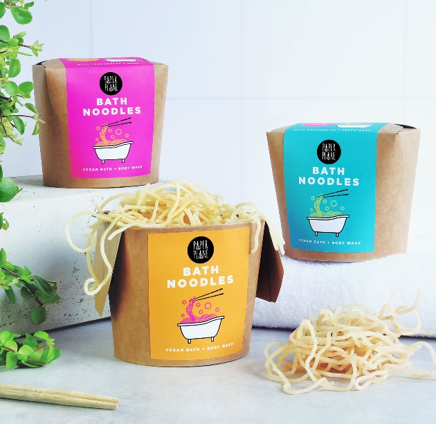 brown paper takeaway style boxes with bath noodles 