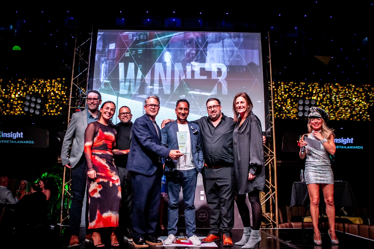 Creative Retail Awards group on stage winning awar