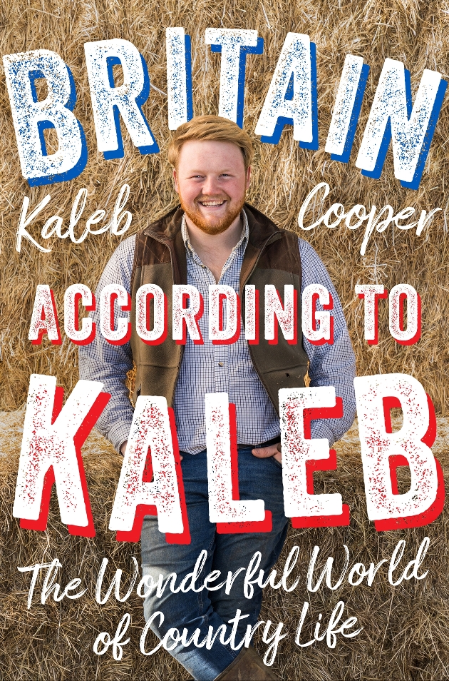 Kaleb on cover in front of hay bales on farm