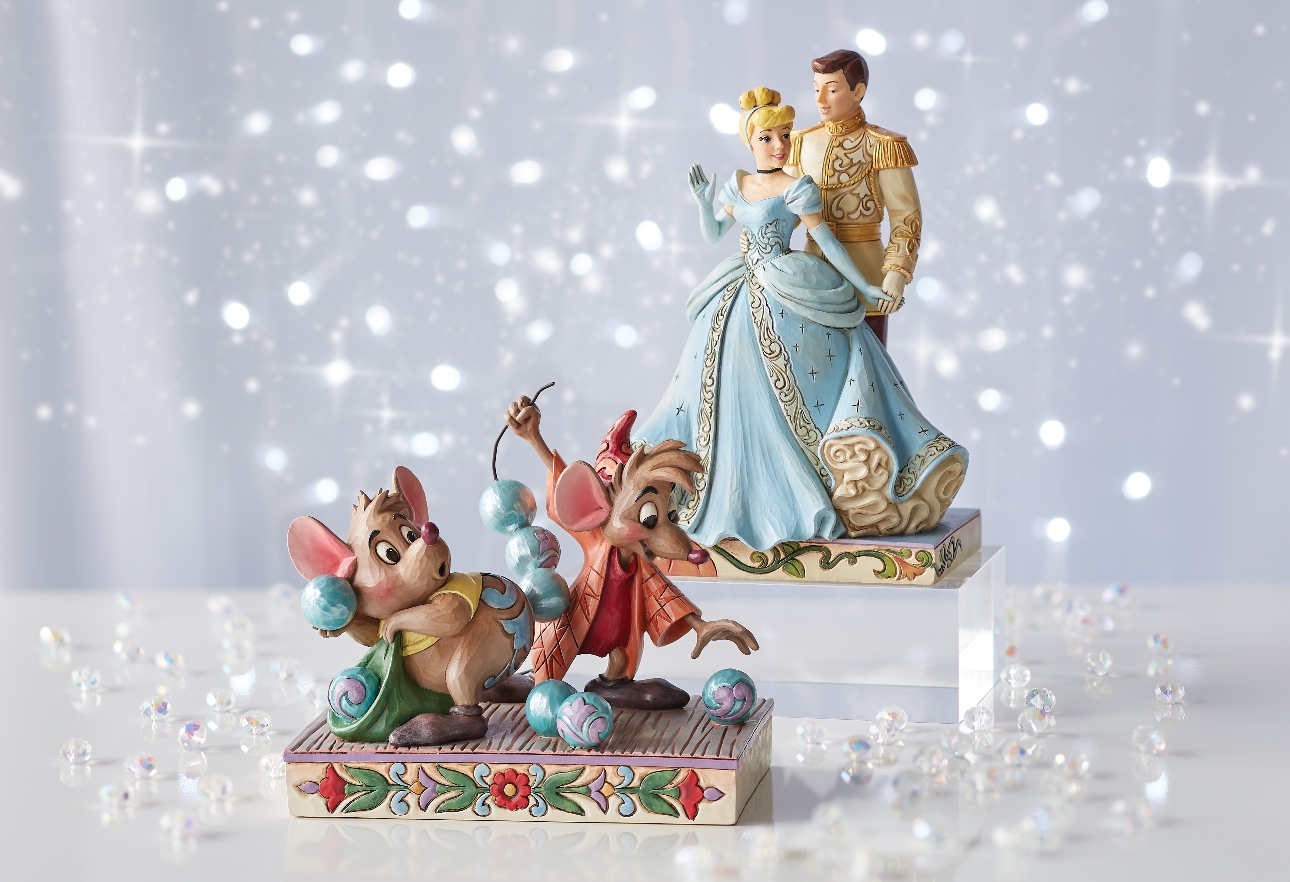 Cinderella and prince charming on a stand, and two mice on a stand 