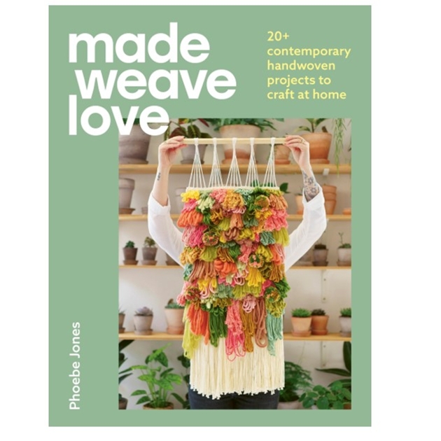 green book cover with someone holding up an item they have weaved