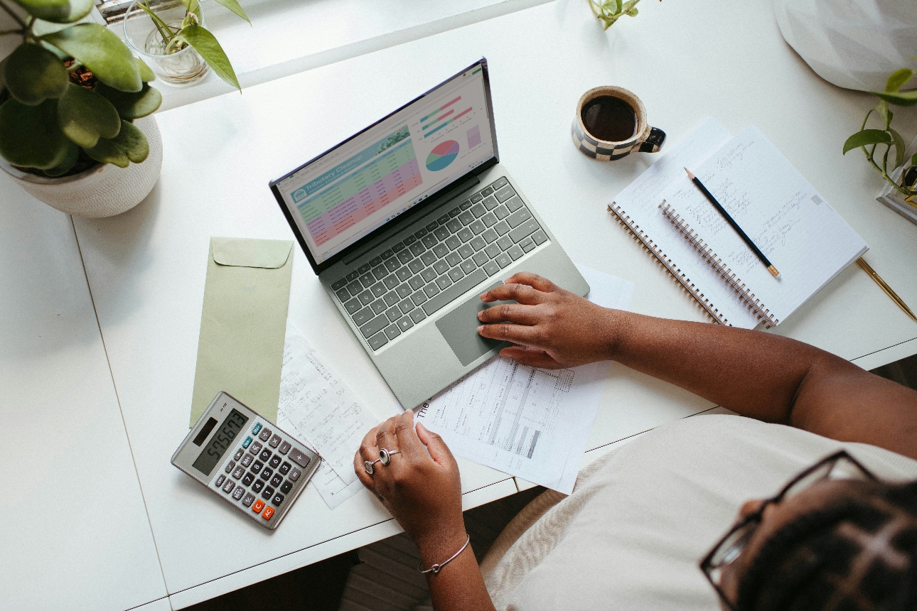 woman at desk at laptop