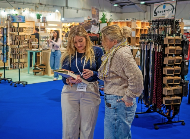 two ladies at a trade show in discussion